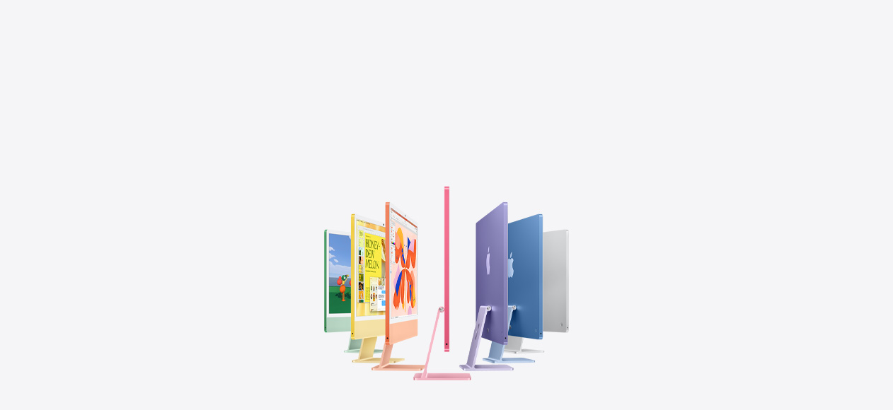 綠色、黃色、橙色、粉紅色、紫色、藍色和銀色七款 iMac 型號，呈手風琴狀排開