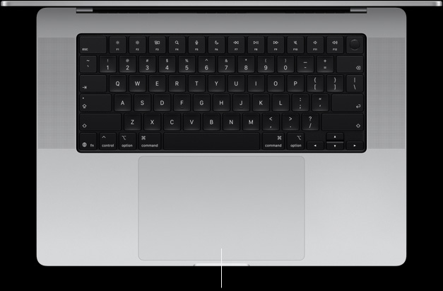 MacBook Pro, silver color, open, showing keyboard and Force Touch trackpad