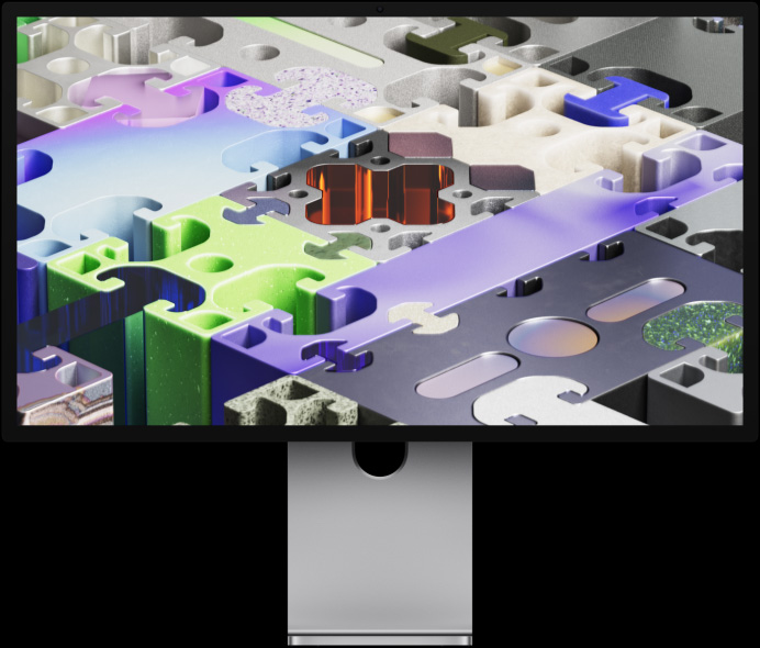 Front of Studio Display XDR with a three-dimensional puzzle-like wallpaper